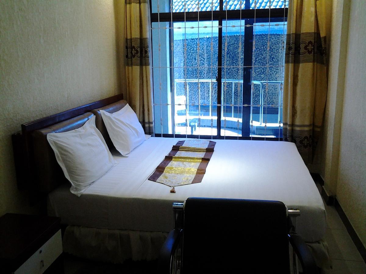 Best Point Hotel Dar es Salaam Quarto foto